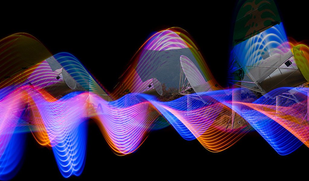 colorful waves with ata in background